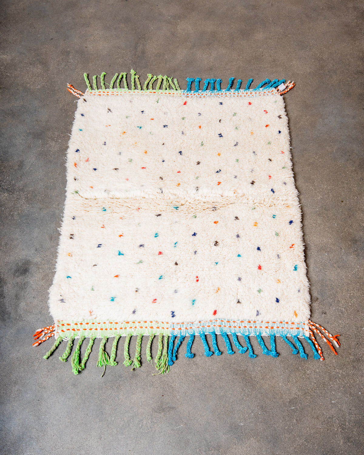 Modern, designer, handcrafted Berber rug from Morocco. Beniourain carpet with beautiful colours and patterns and fluffy wool texture.